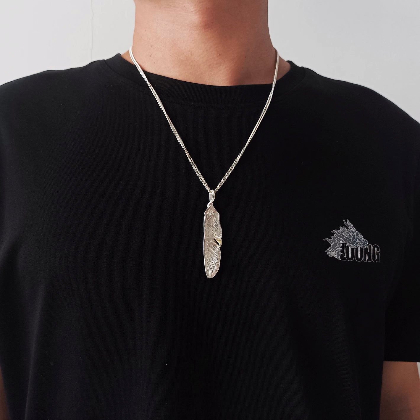 Eagle Feather Pendant with 18K Gold Snake Eye