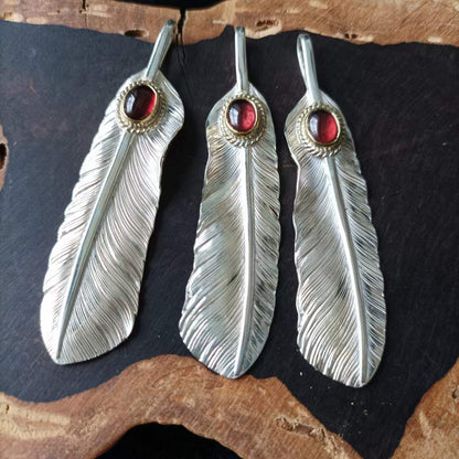 Red-tailed Hawk Feather with Garnet Gemstone